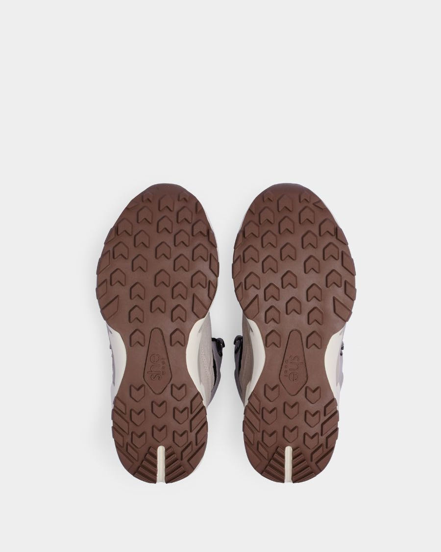 Hardwearing, brown, slip resistant rubber outsole.