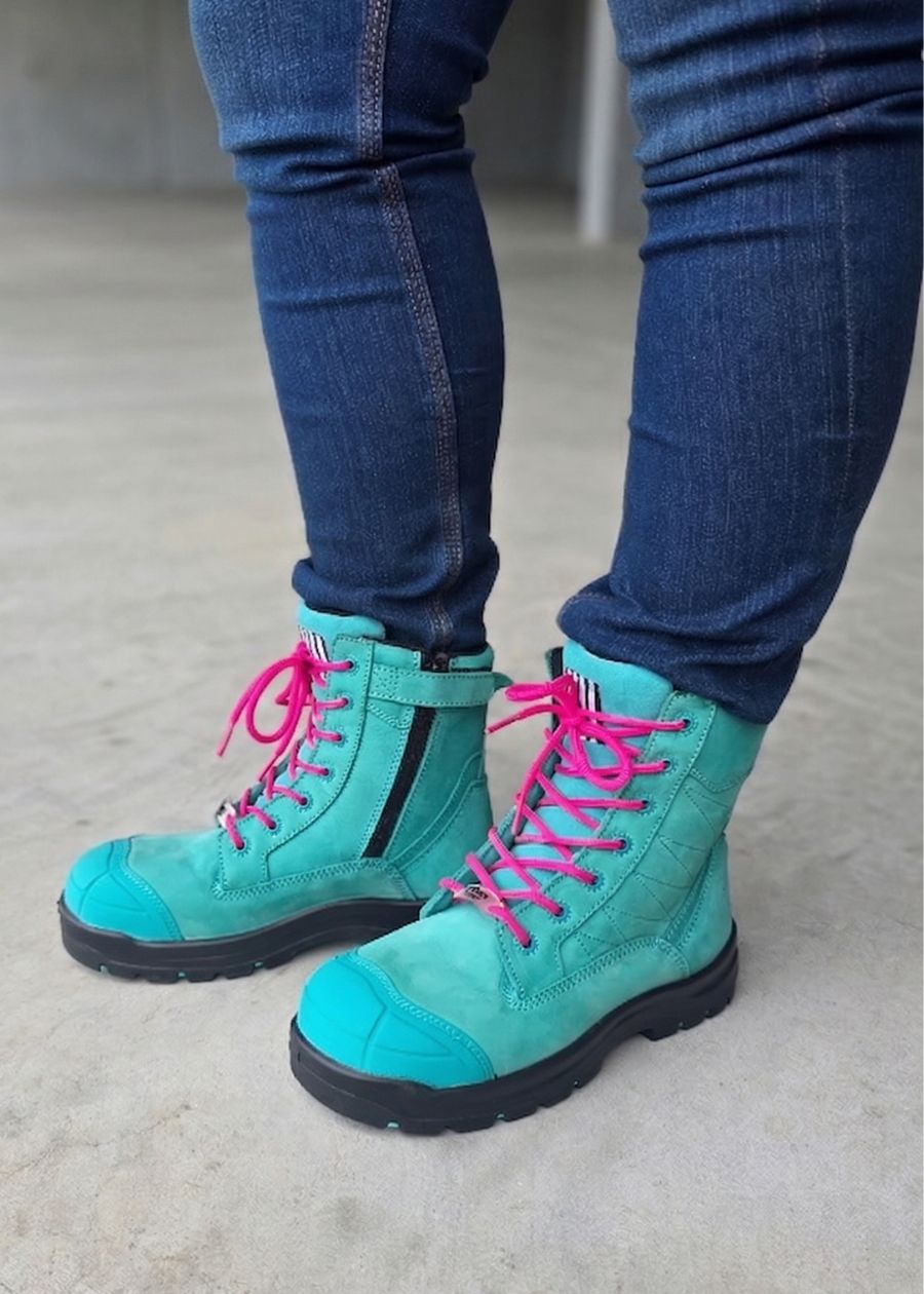 Women stood wearing aqua safety boots 