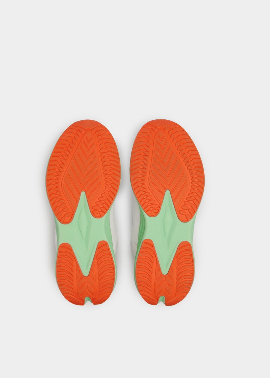 view of orange and mint green slip resistant rubber outsole 