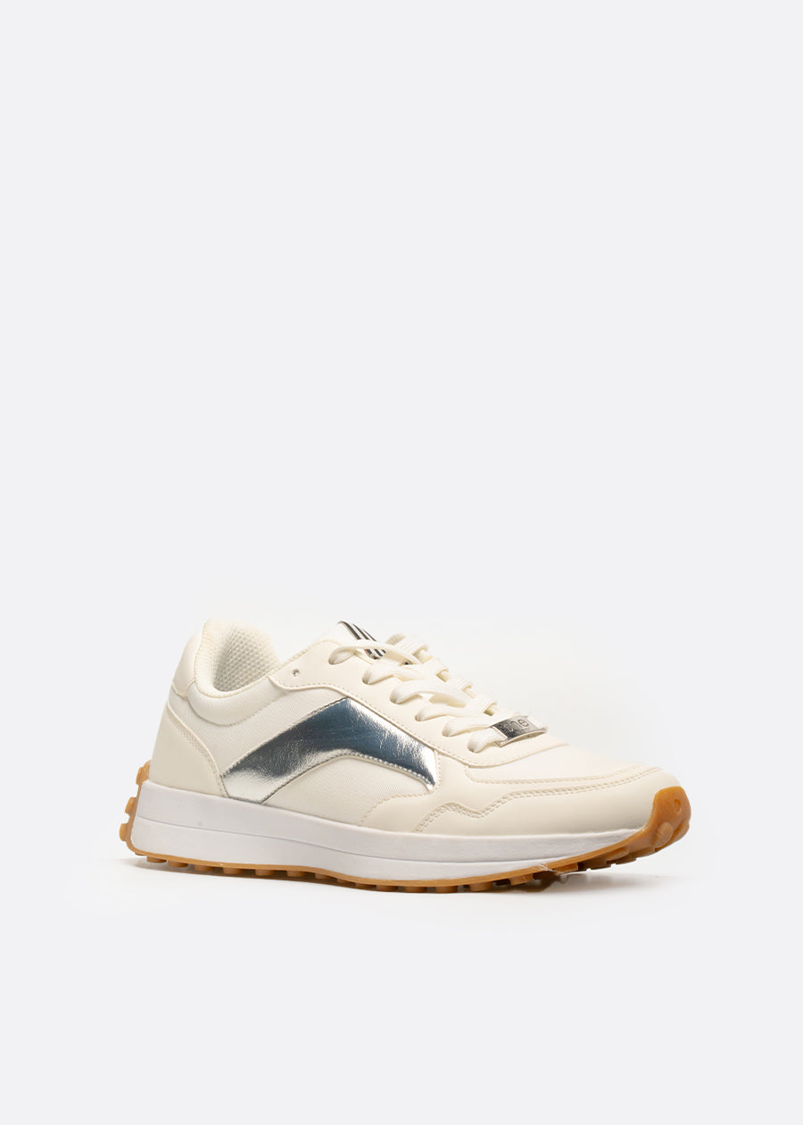 Side profile of a vegan white sneaker with a silver embellishment 