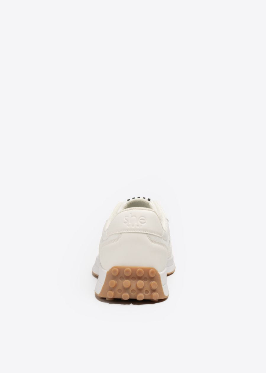 Women's fashion sneakers with a firm heel counter for added stability and support 