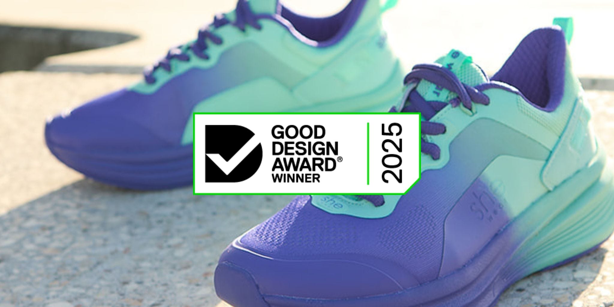 Purple and aqua mesh walking shoes with 2025 Good Design Award Winner badge. 