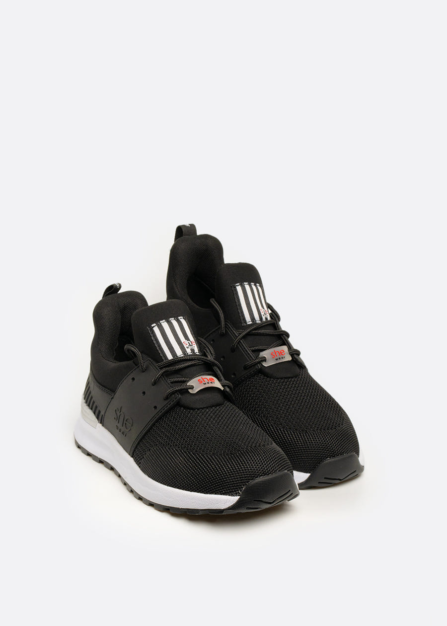 pair of black pull-on walking sneakers made from light weight mesh material