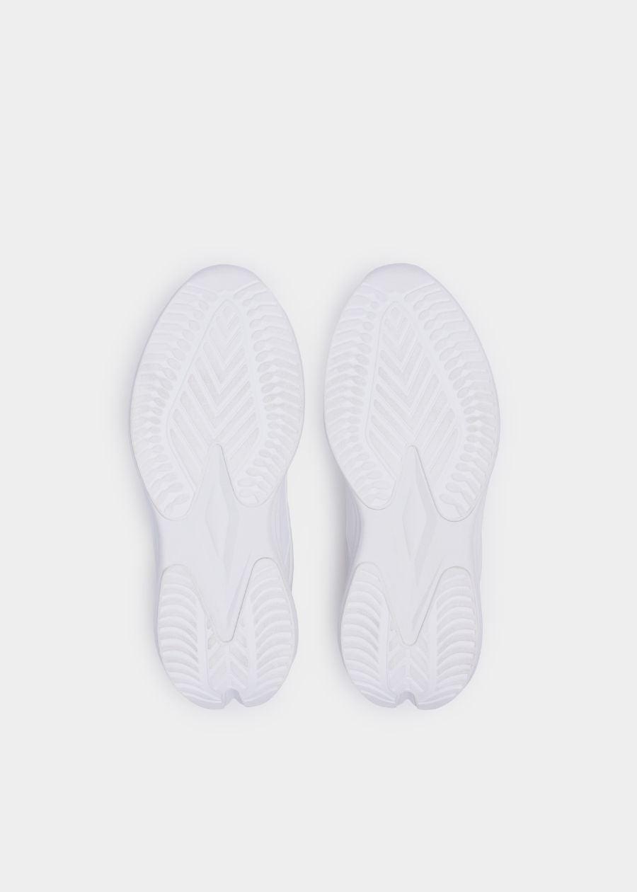 Sole of white walking shoe