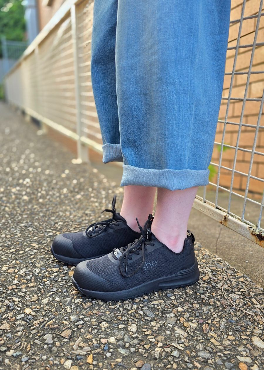 Side view of composite cap mesh sneakers.