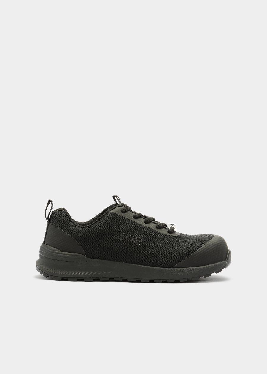 Side view of black composite cap safety sneaker 