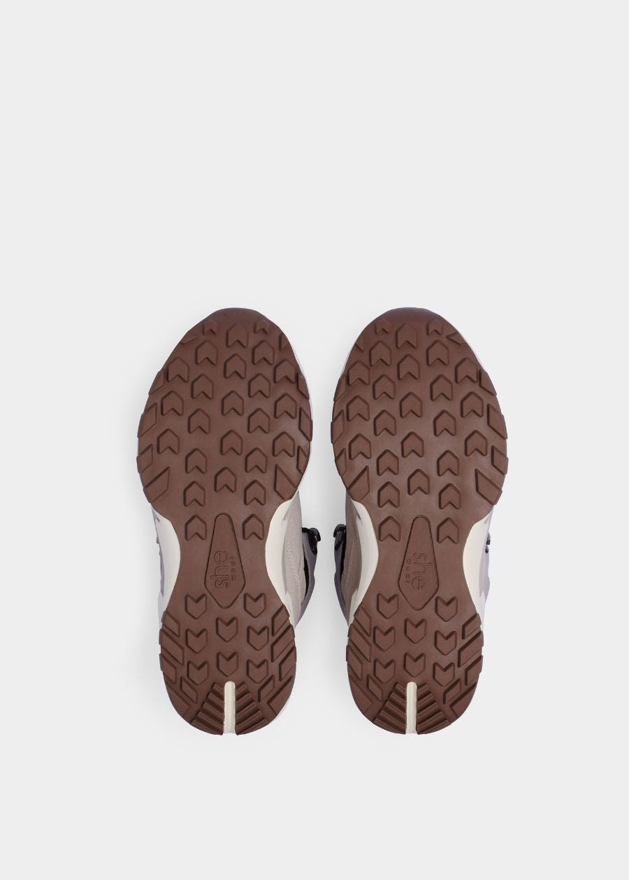 Hardwearing, brown, slip resistant rubber outsole.
